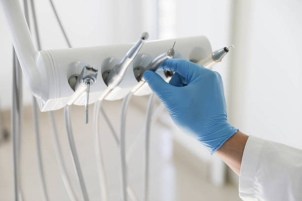 Professional Tooth Extraction technician working in Naperville, IL